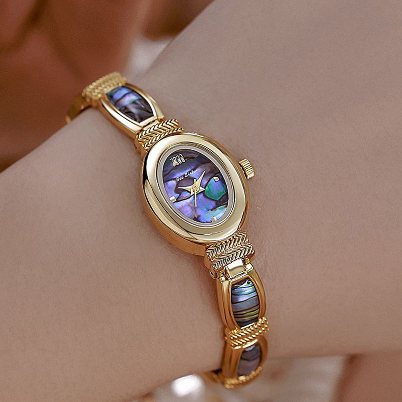 البيضاوي الهاتفي النساء ساعات  - مراجعة Luxury Watch Brand For Women وسعره